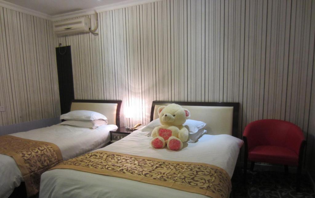 Jiujiu Holiday Hotel Sanghaj Szoba fotó