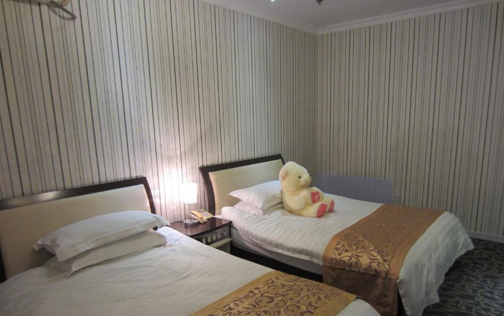 Jiujiu Holiday Hotel Sanghaj Szoba fotó