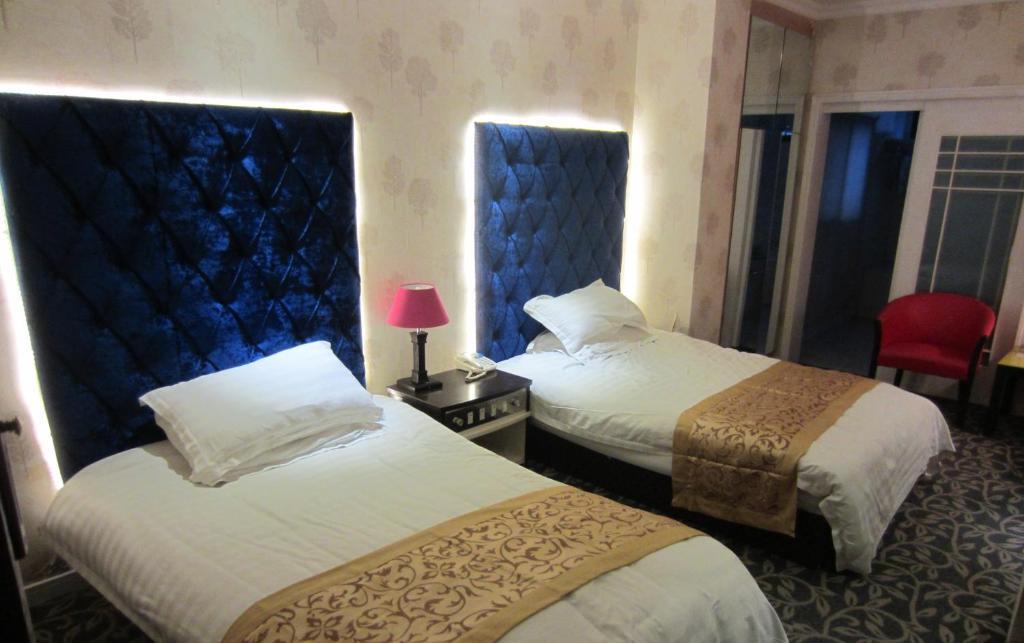 Jiujiu Holiday Hotel Sanghaj Szoba fotó